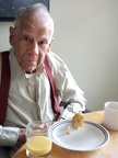 Bob Viosca Mardi Gras Breakfast 2022 -- Dad having his after breakfast king cake, Mardi Gras 2022.