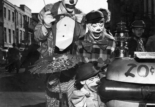 Mardi Gras Clowns ca 1946 (2137 visits) Mardi Gras clowns dining on a Lucky Dog. ca 1946 This is a photoshop restored version of the photo.... Mardi Gras Clowns ca 1946