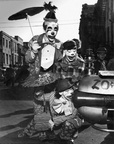 Mardi Gras Clowns ca 1946 -- Mardi Gras clowns dining on a Lucky Dog.  ca 1946 This is a photoshop restored version of the photo. L-R: Joseph Rene Martin, Alice Baudean Viosca, Fay Viosca Martin. From Fay Viosca Collection Fay Viosca Pics 201