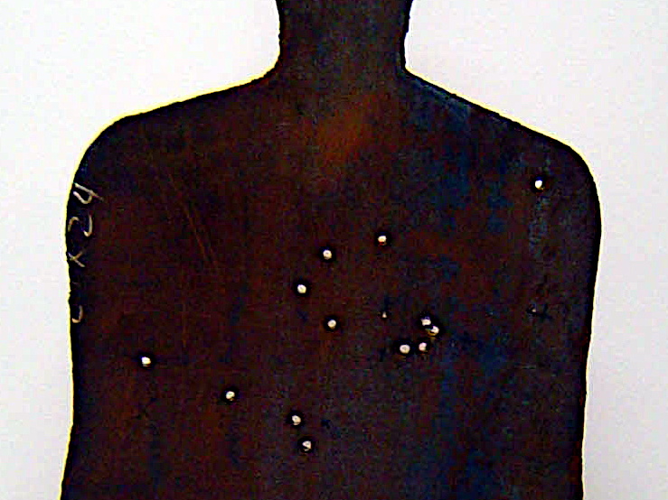 Guns don't kill... (Front) (3408 visits) The front side of the sculpture. Protest against automatic weapons in the wrong hands. See back sid... Guns don't kill... (Front)