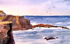 Cliffs at Kilkee, Ireland -- A panoramic view of the cliffs showing people standing on the edge as very small in scope.